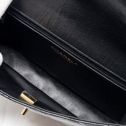 Chanel 23A classic flap clutch shiny calfskin black L (microchip)