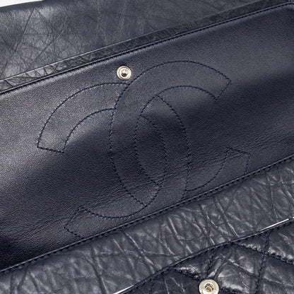 Chanel Maxi 2.55 Reissue flap bag aged calfskin dark blue ruthenium hardware