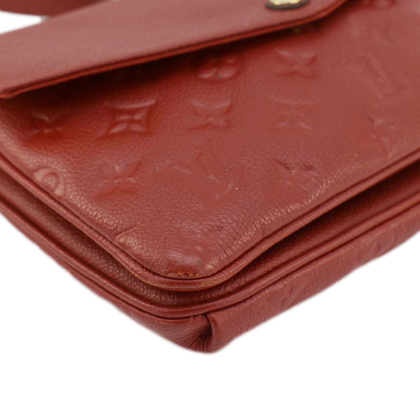 LOUIS VUITTON Twice Pochette Monogram Empreinte Crossbody Bag Red
