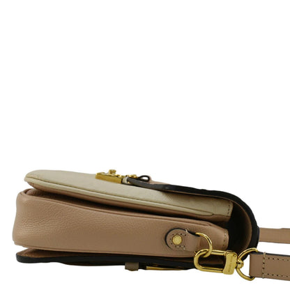 LOUIS VUITTON Metis Pochette Empreinte Leather Crossbody Bag Light Pink