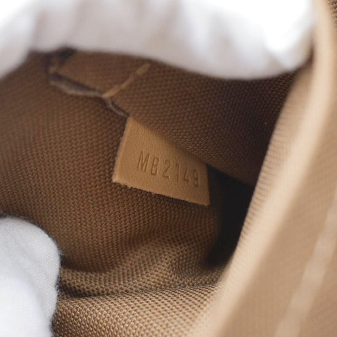 LOUIS VUITTON Pochette Monogram Canvas Accessoires Pouch Brown