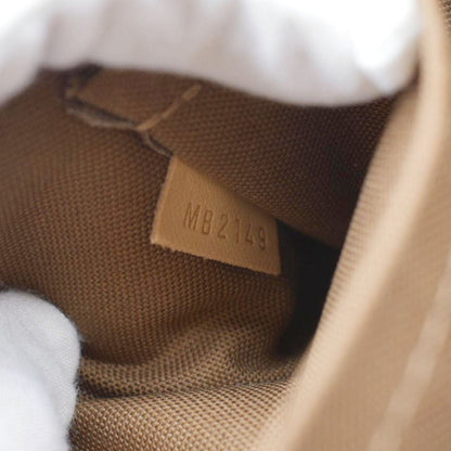 LOUIS VUITTON Pochette Monogram Canvas Accessoires Pouch Brown