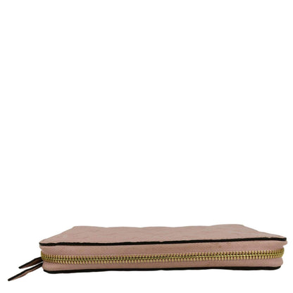 LOUIS VUITTON Clemence Empreinte Leather Wallet Dusty Pink