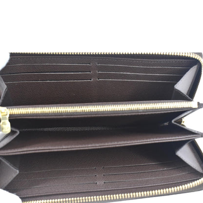 LOUIS VUITTON Damier Ebene Zippy Wallet Brown