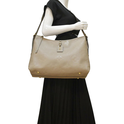 LOUIS VUITTON Carryall MM Monogram Empreinte Shoulder Bag Tourterelle Gray