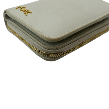YVES SAINT LAURENT Tiny Monogram Compact Leather Zip Around Wallet White
