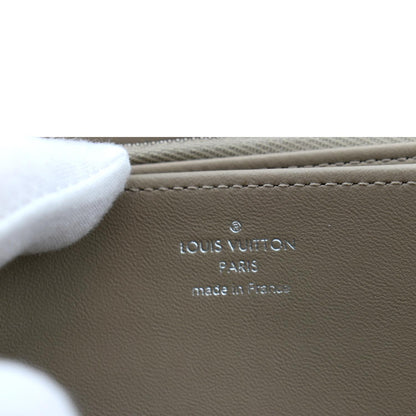 LOUIS VUITTON Mahina Leather Zippy Wallet Galet Beige