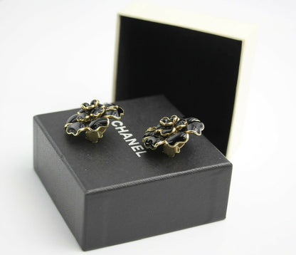 Chanel Vintage 02A Gripoix Shiny Black Large Camellia Clip-on Earrings