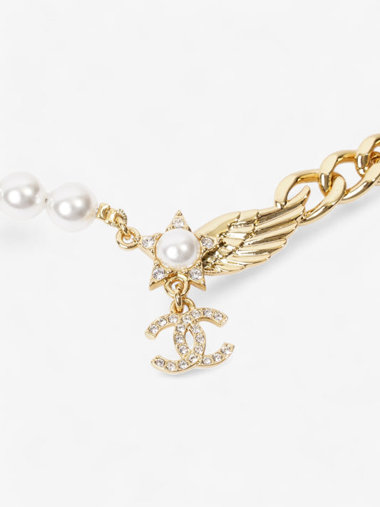 Chanel CC Star Wing Faux Pearl Choker Pearl / Gold Base Metal