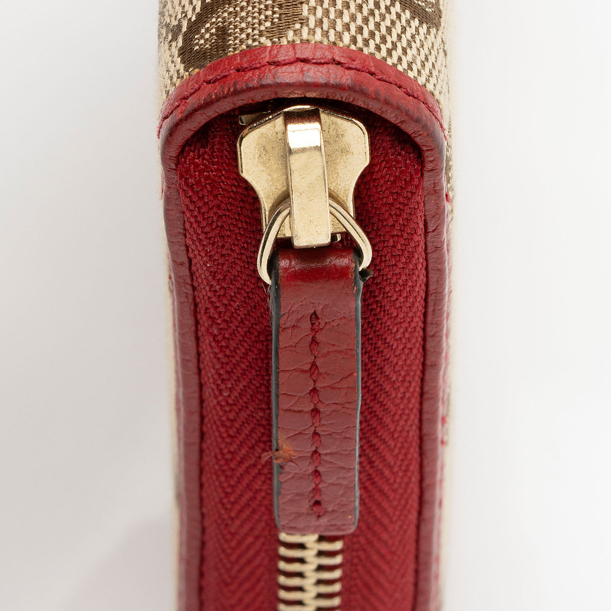 Gucci GG Canvas Zip Around Wallet (SHF-pjF8AV)