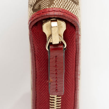 Gucci GG Canvas Zip Around Wallet (SHF-pjF8AV)