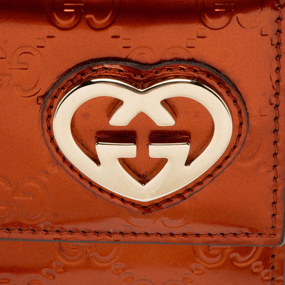 Gucci Metallic Patent Guccissima Leather Heart Logo Wallet (SHF-jwQhWg)