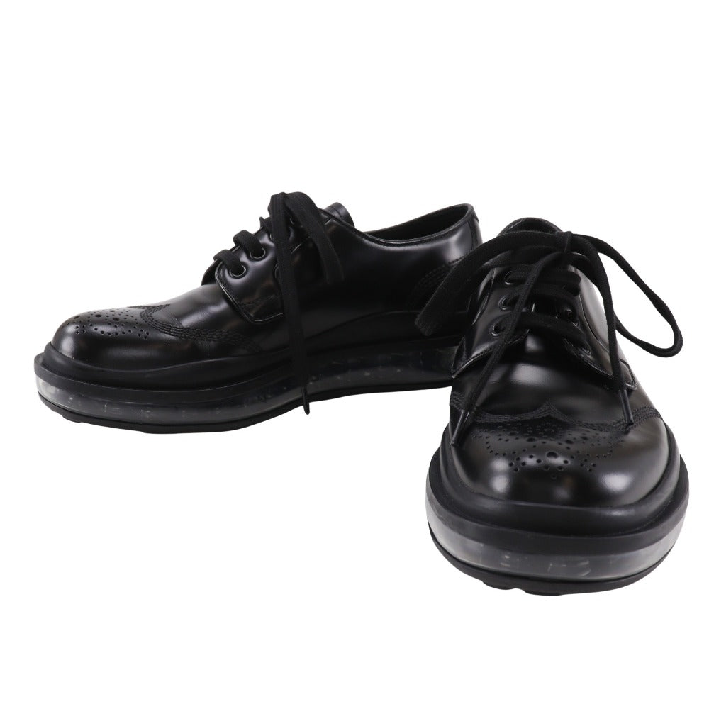 Prada Wingtip Leather Sneakers