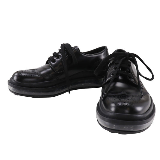 Prada Wingtip Leather Sneakers
