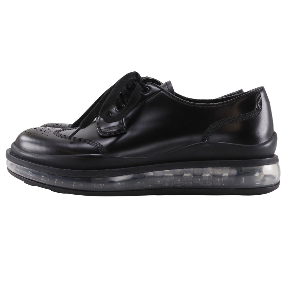Prada Wingtip Leather Sneakers