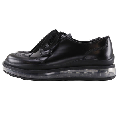Prada Wingtip Leather Sneakers