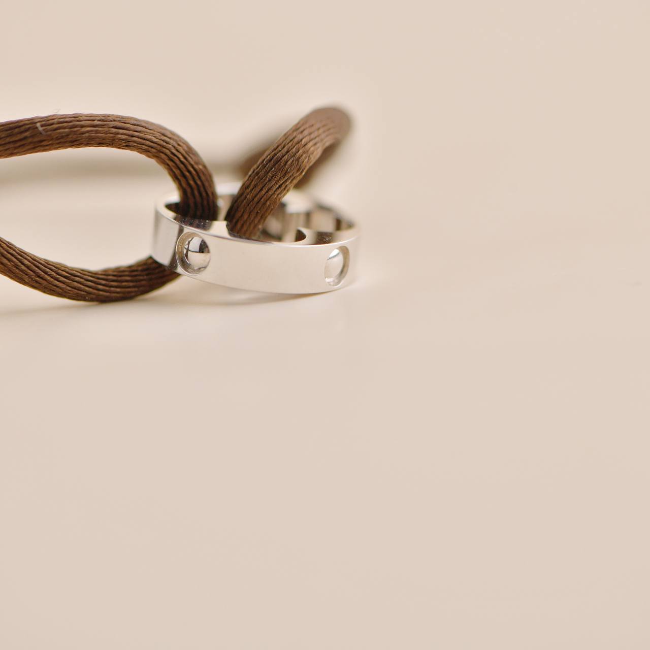 Louis Vuitton Empreinte 18K White Gold Brown Cord Bracelet