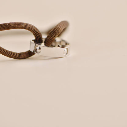 Louis Vuitton Empreinte 18K White Gold Brown Cord Bracelet