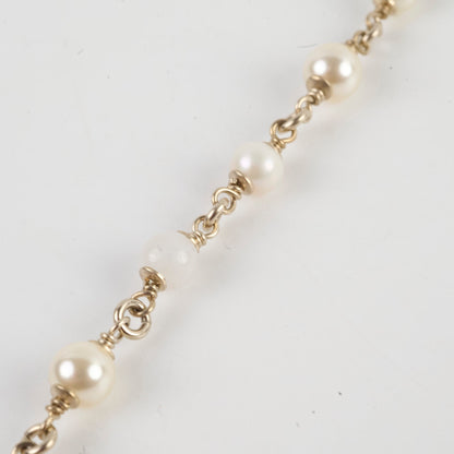 Chanel Long Pearl CC Crystal Necklace
