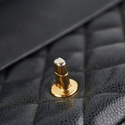 Chanel Maxi Jumbo Double Flap Black Caviar