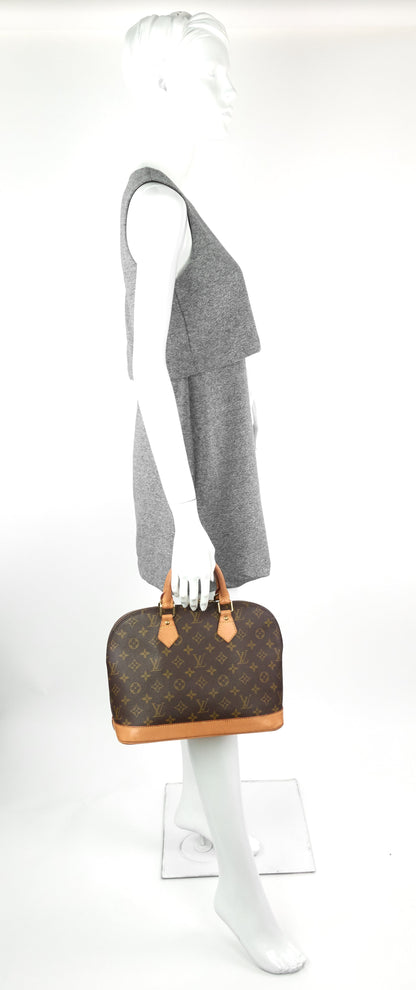 Louis Vuitto Alma MM Vintage Monogram Canvas Bag