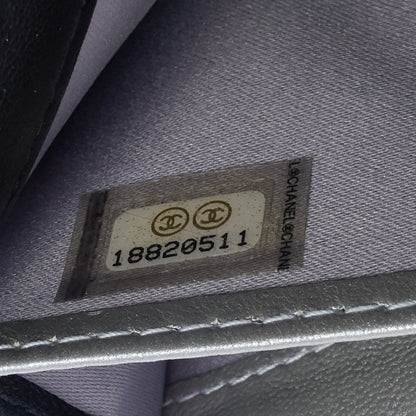 Chanel Embossed Camellia Lambskin Flap Wallet