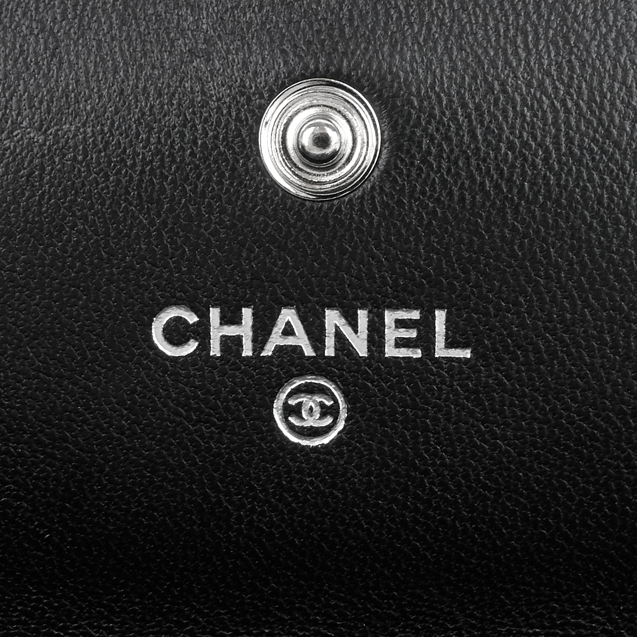 Chanel Embossed Camellia Lambskin Flap Wallet