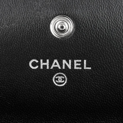 Chanel Embossed Camellia Lambskin Flap Wallet