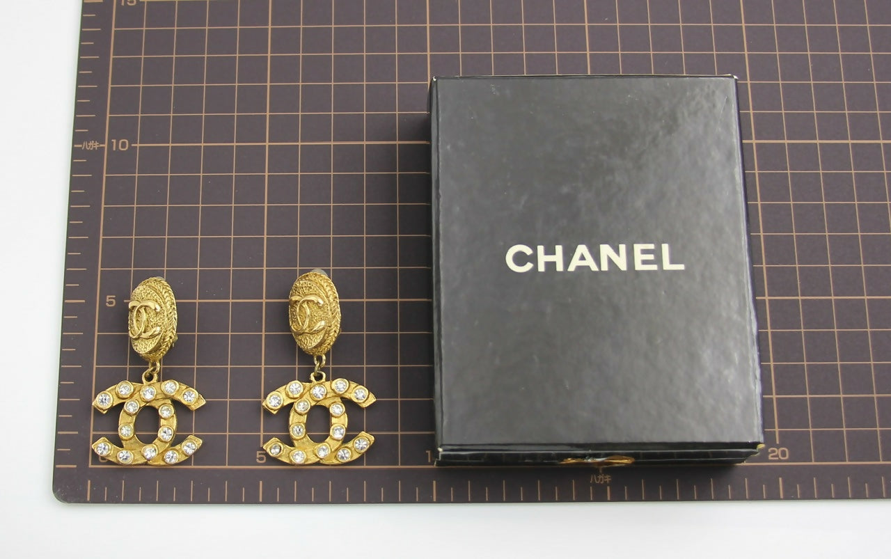 Chanel Vintage 71-80s Rhinestone & Gold-plated Round Relief Dangle Clip-on Earrings