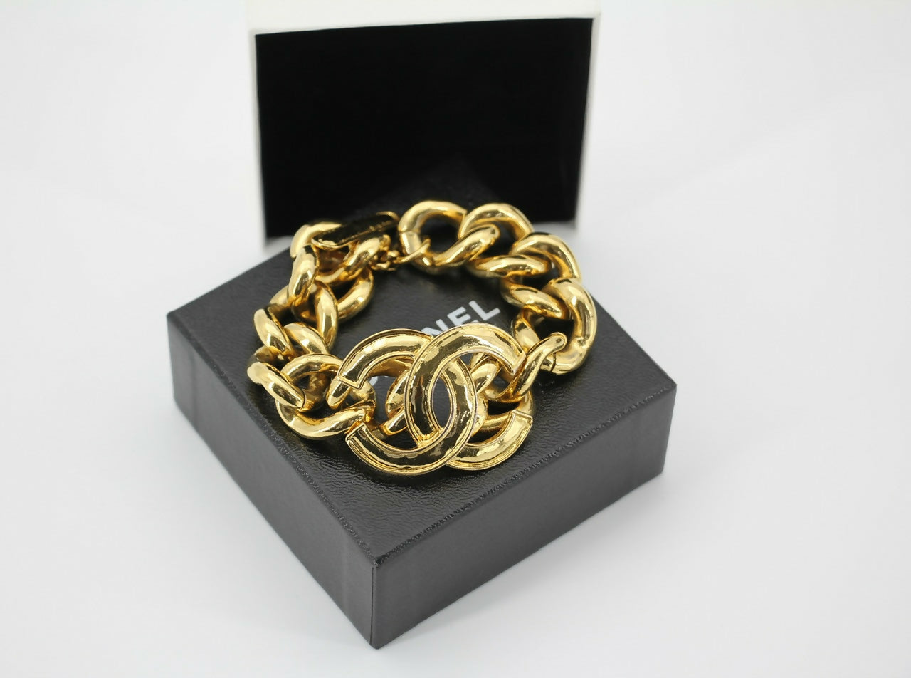 Chanel Vintage 94P Gold-plated CC Wave Rotating Lock Bracelet