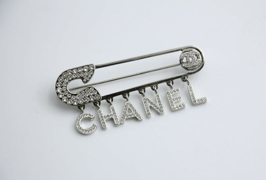 Chanel B18P Rhinestone Metal Thick ‘CHANEL’ Brooch