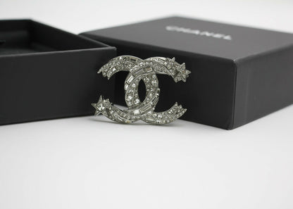 Chanel C21S Rhinestone Metal Silver Star Twist Brooch
