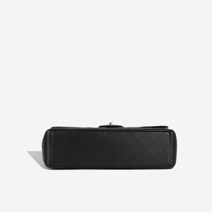 Chanel Maxi Classic Flap - Black Caviar