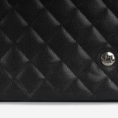 Chanel Maxi Classic Flap - Black Caviar