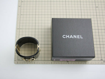 Chanel 13C Metal Resin Black Flower Bracelet Cuff