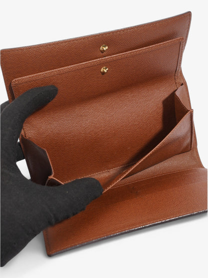 Louis Vuitton Porte Tresor International Wallet Monogram Coated Canvas