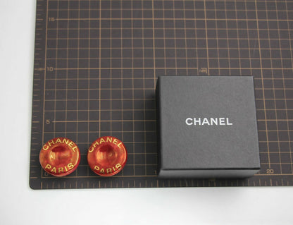Chanel Vintage 97P Resin Big Red ‘CHANEL’ Round Gold-plated Clip-on Earrings