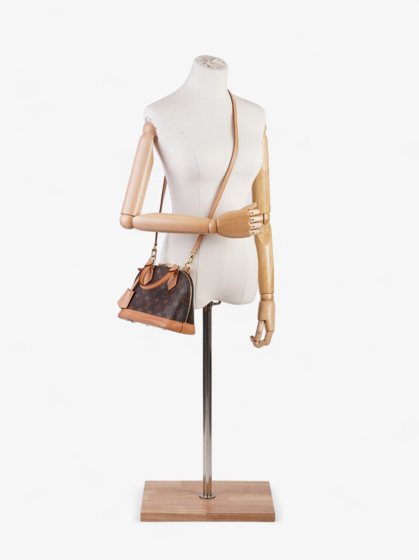 Louis Vuitton Alma BB Monogram Coated Canvas