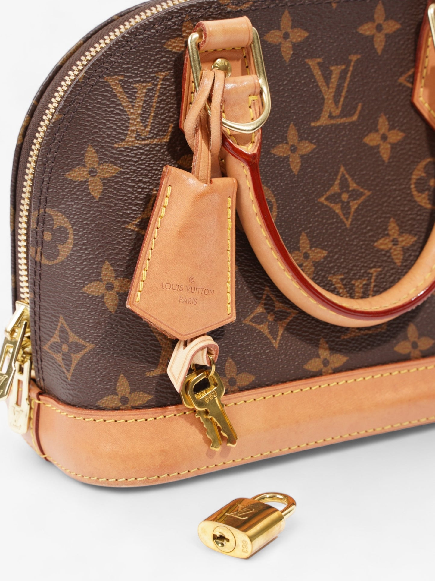 Louis Vuitton Alma BB Monogram Coated Canvas