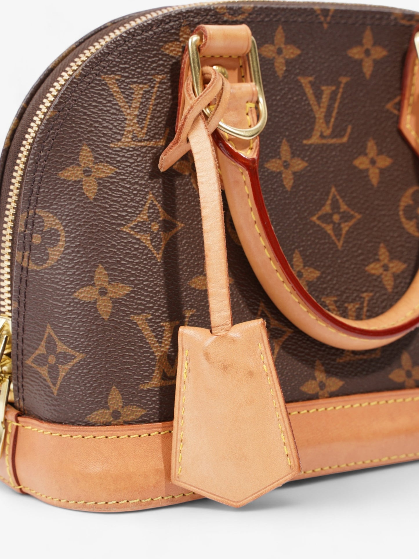 Louis Vuitton Alma BB Monogram Coated Canvas