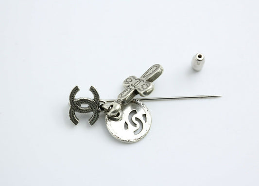 Chanel Vintage 03P Metal Cross Silver Coin CC Brooch