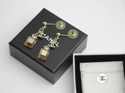 Chanel Vintage 08A Acrylic Perfume Bottle Stud Earrings