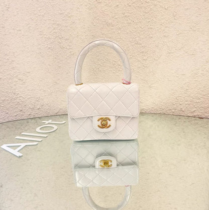 Chanel White Quilted Lambskin CC Top Handle Mini Kelly Bag Gold Hardware, 1994