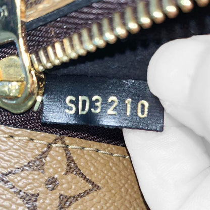 LOUIS VUITTON Metis Pochette Reverse Monogram Canvas Crossbody Bag Brown
