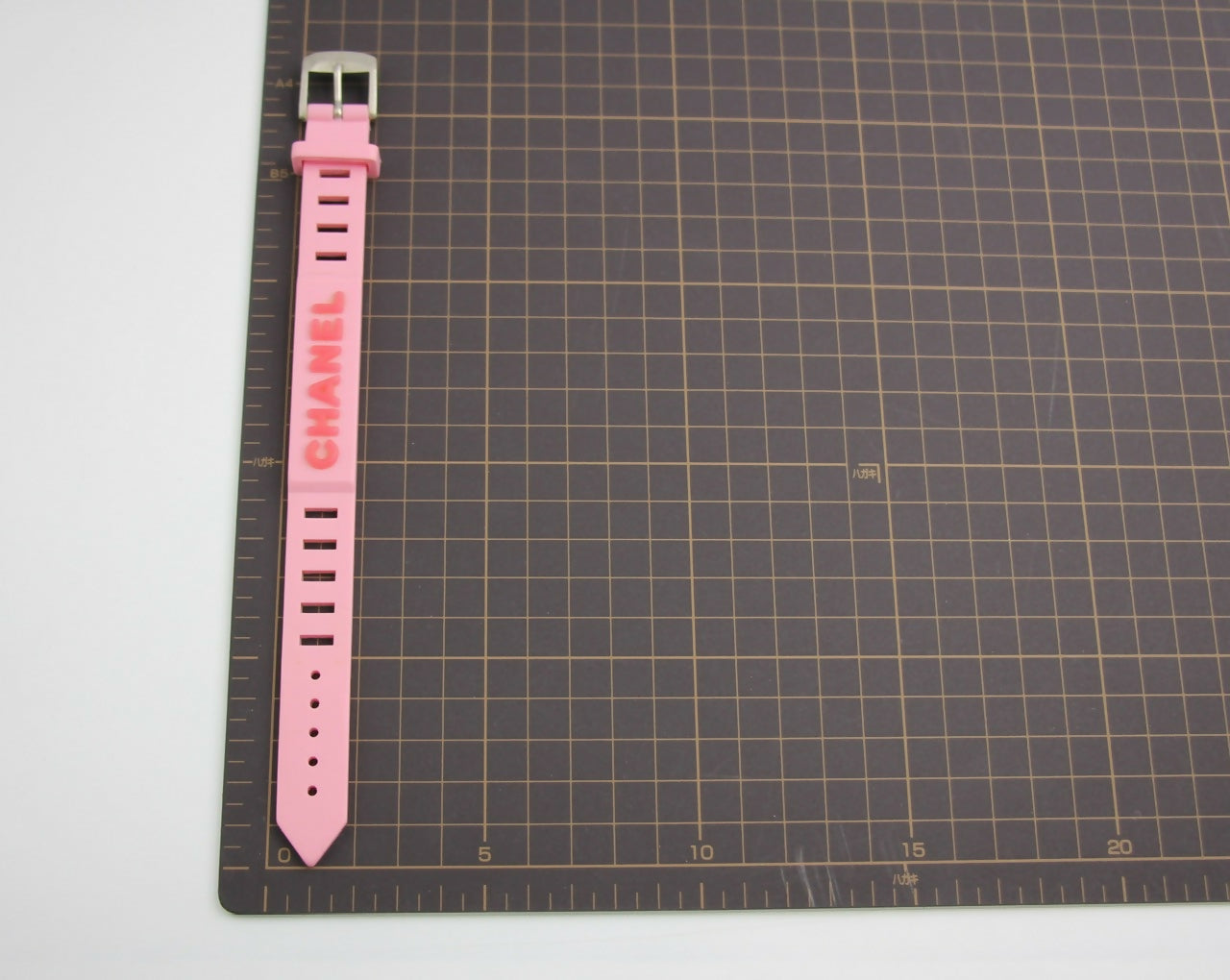 Chanel Vintage 99P Rubber Pink with Peach Wording Bracelet