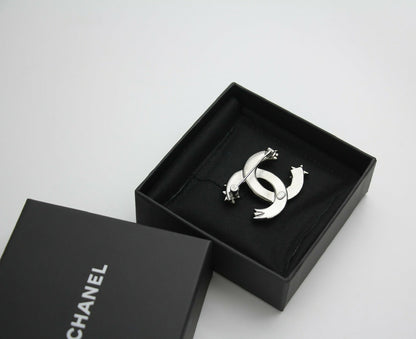 Chanel C21S Rhinestone Metal Silver Star Twist Brooch