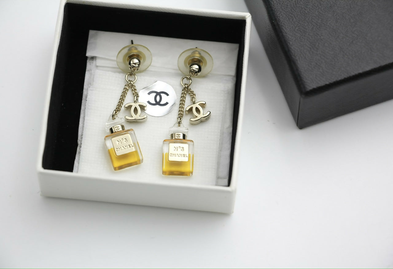 Chanel Vintage 08A Acrylic Perfume Bottle Stud Earrings