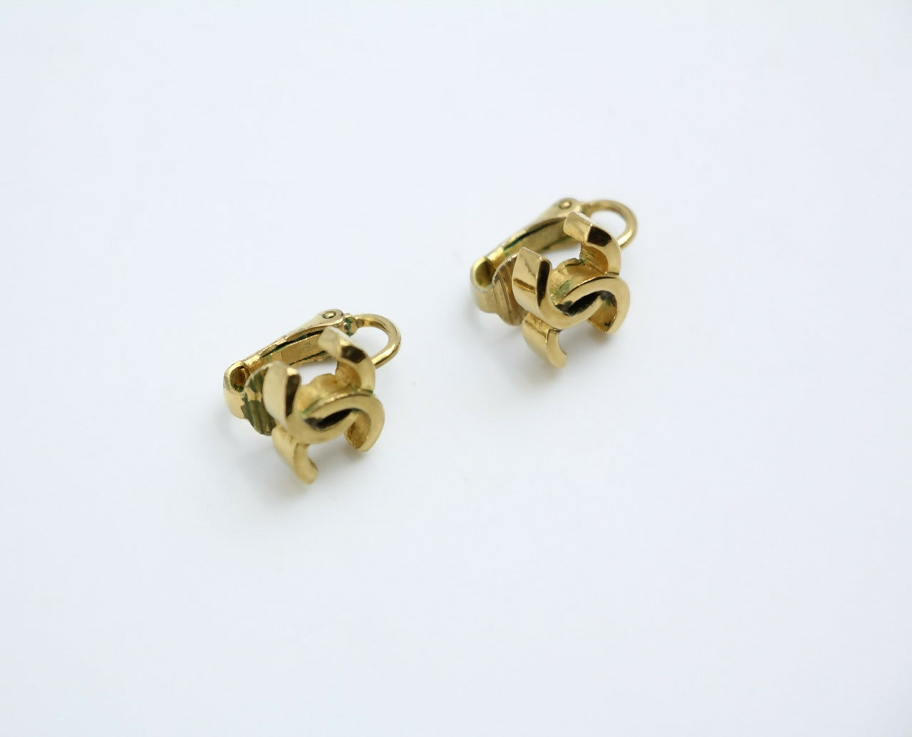 Chanel Vintage 1971-80 Gold-plated Curved Buckle CC Clip-on Earrings