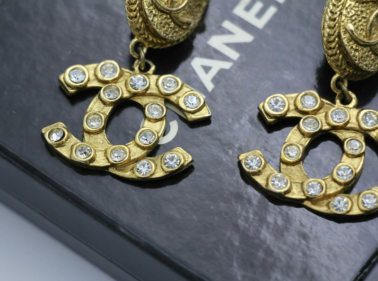 Chanel Vintage 71-80s Rhinestone & Gold-plated Round Relief Dangle Clip-on Earrings