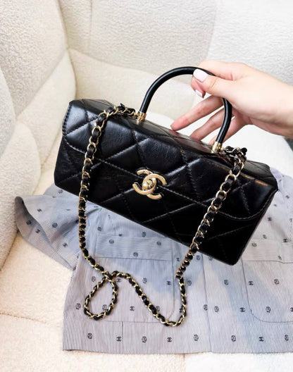 Chanel 23K waxed leather black gold long vanity bag
